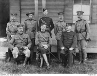 Group of officers, including Captain J.F.Flashman (back row far right) and Major R.C.Simpson (back row second from right) c.1905-1908 [ png ]