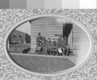 Frank with 6 soldiers outside an army hut [ jpeg ]